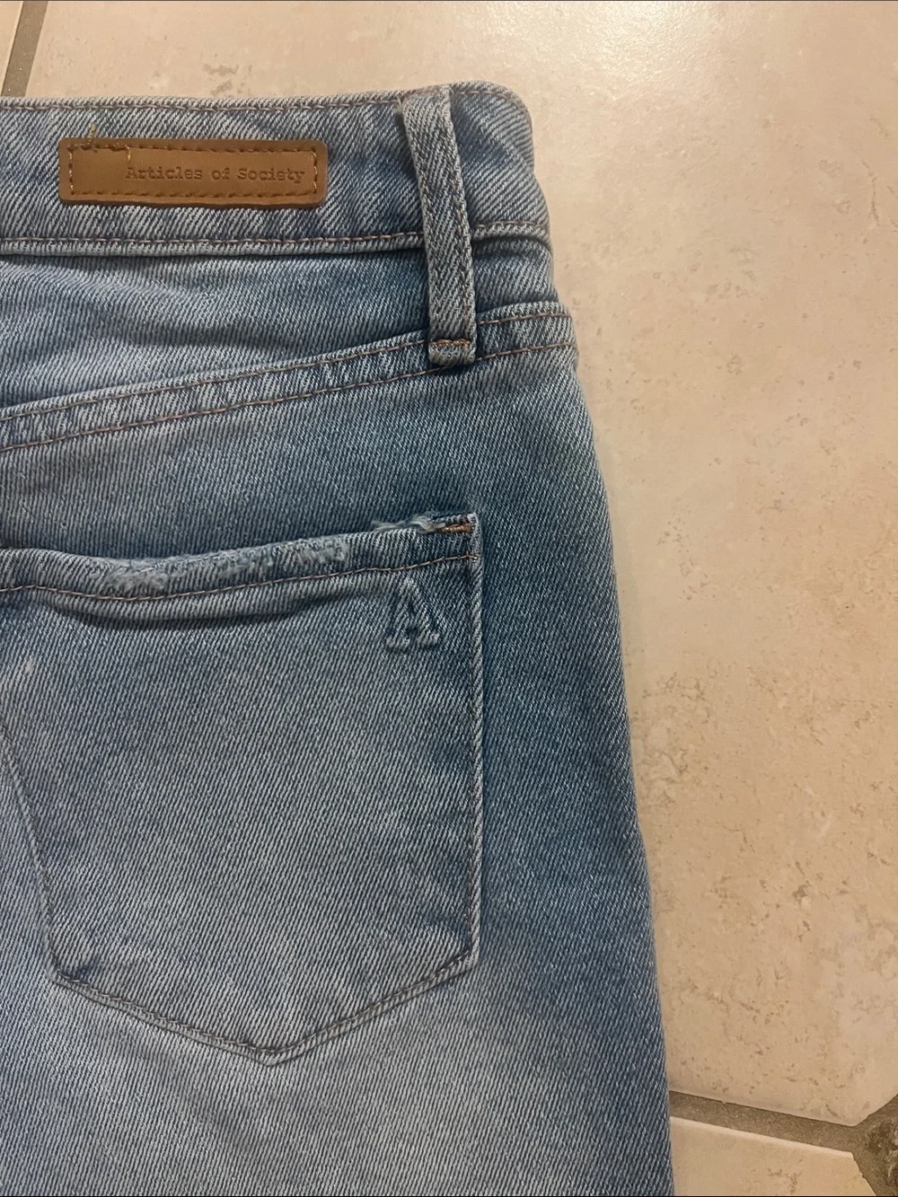 Articles Of Society Light Wash Distressed Denim Cutoff Shorts